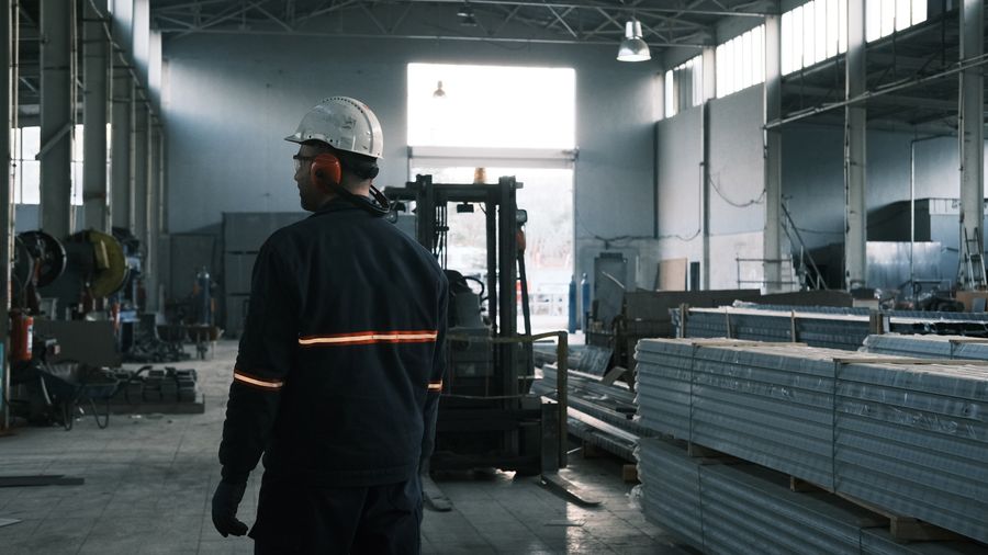 Industrial worker in a modern factory setting